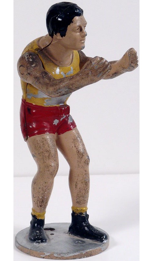 Large Vintage Metal Mechanical Boxer or Wrestler Figure: This is a vintage boxing or wrestling figure from some sort of game or display - maybe a coin-operated machine/bank/toy. The arms move up and down. SIZE: Nearly 9" tall with a 3 1/2" base. Weighs over