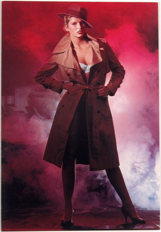 1983 Greeting Card BLONDE IN TRENCH COAT & LINGERIE: This is a vintage 1983 risque greeting card with a photograph by Jim Shea titled Again Sam. Text inside reads Play with it again, Sam!. Paper Moon Graphics, Los Angeles. **MORE nude/risque cards (from