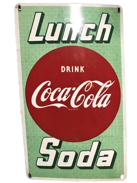 Coca Cola Sign: Porcelain sign with the iconic Coca Cola Script inside a red circle. Lunch written above and Soda below. Reg. U.S. Pat. Off. A little wear around the edges. One pock mark on the "a" in Coca. Approx. 3