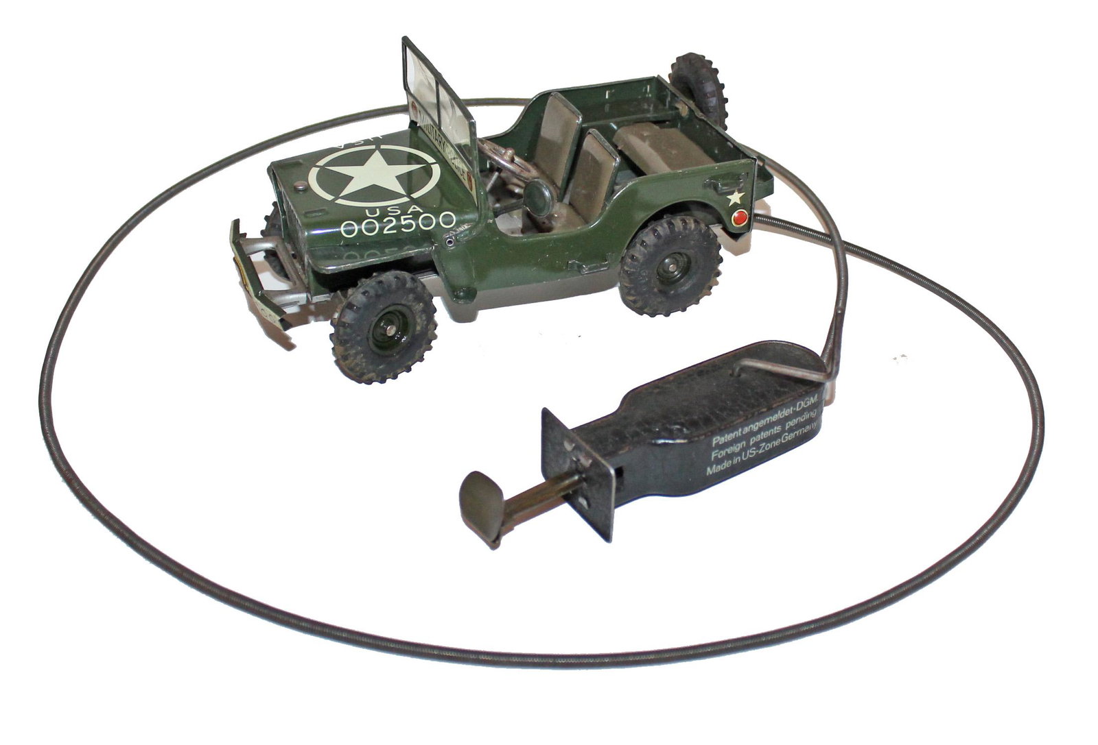 US Army Jeep: Toy Army Jeep - Decal on bottom: Arnold. Etched on bottom undercarriage: Cole Distribution For USA Skoja - Richard, Inc New York. On both bumpers: Arnold 2500. On tags: J-2500 US Army 1953. Jeep is pr