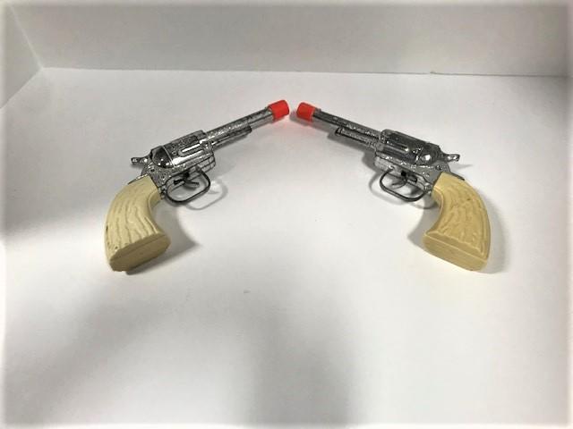 Cap Pistols: Matched set.