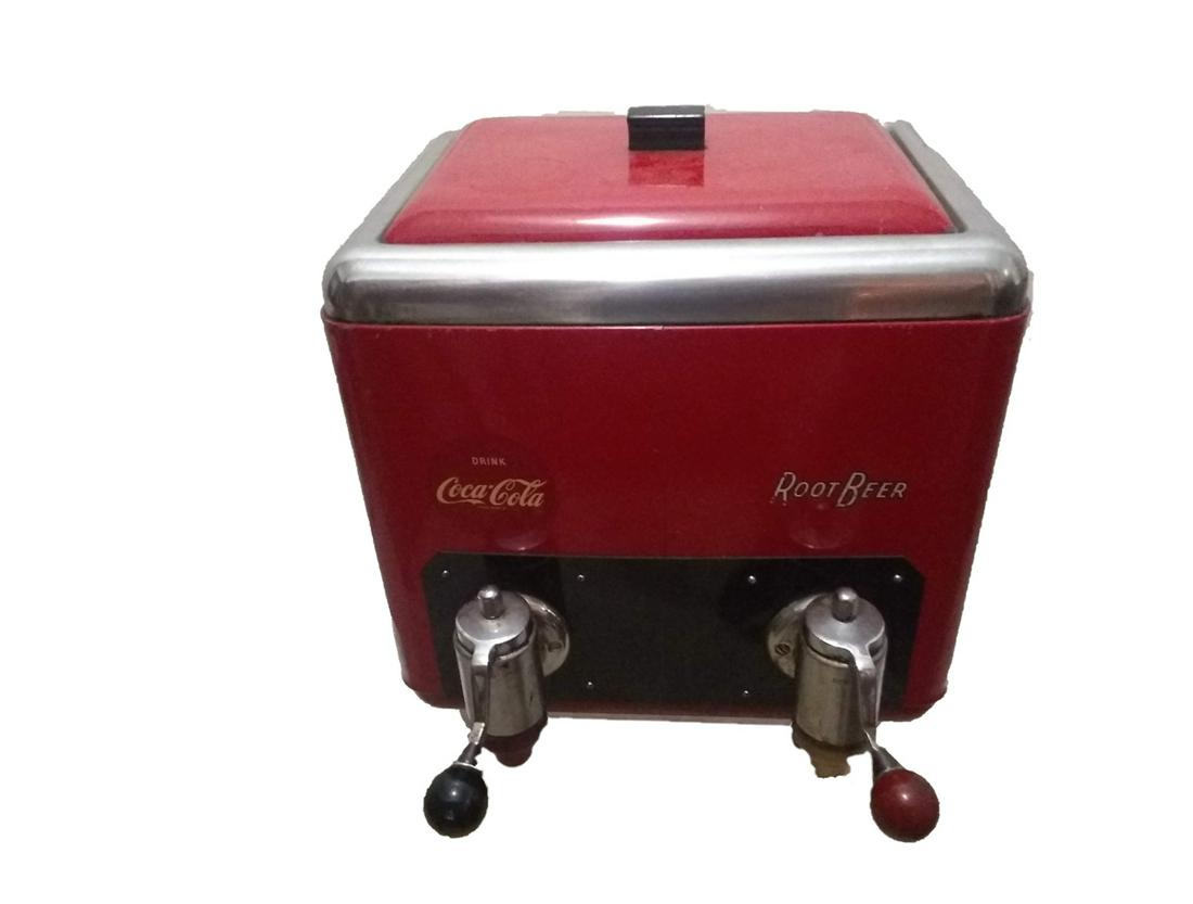 Coca Cola Dispenser: Rectangular dispenser for Coca Cola and Root Beer soft drinks.