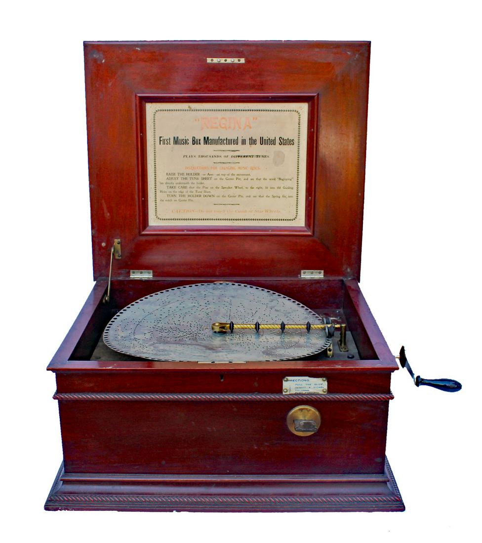 20" Regina Tabletop disc-player.  Oak.  Coin-operated. (1 of 2)