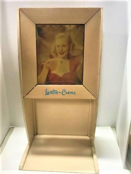Lustre CrÃ¨me lighted advertisement. The lovely lady: Lustre CrÃ¨me lighted advertisement. The lovely lady transforms before your eyes. She winks at you. Image believed to be that of a very young Marilyn Monroe who was known for doing advertisements fo