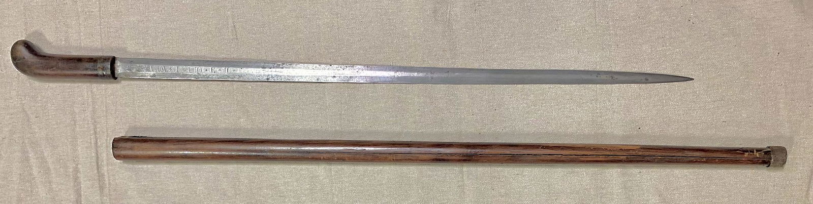 Circa 1880s Italian sword/walking cane. All wood grip: Circa 1880s Italian sword/walking cane. All wood grip and cane shaft conceals an Italian steel pointed blade. Inscribed with "VIVA*I*DIO*E*IL"