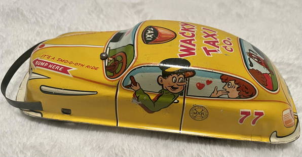 MARX KEY WIND TIN TOY WACKY TAXI: MARX KEY WIND TIN TOY WACKY TAXI NEAR MINT CONDITION APPROXIMATELY 4.5 INCHES LONG