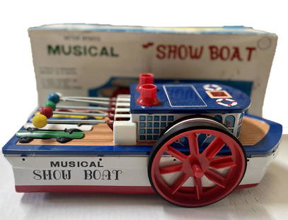 1960S BATTERY OPERATED MUSICAL SHOW BOAT: A 1960S BATTERY OPERATED MUSICAL SHOW BOAT WITH AMAZING LITHO AND AMAZING ORIGINAL PAINT LOOKS APPEARS ONE OF THE PLASTIC EXHAUSTS ARE MISSING