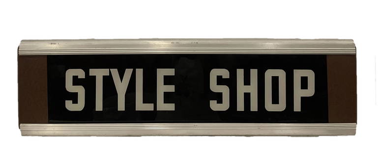 STYLE SHOP LIGHTED SIGN: STYLE SHOP LIGHTED SIGN MEASURES APPROX 25.5 X 7X 4.5 INCHES IS NOT OPERABLE