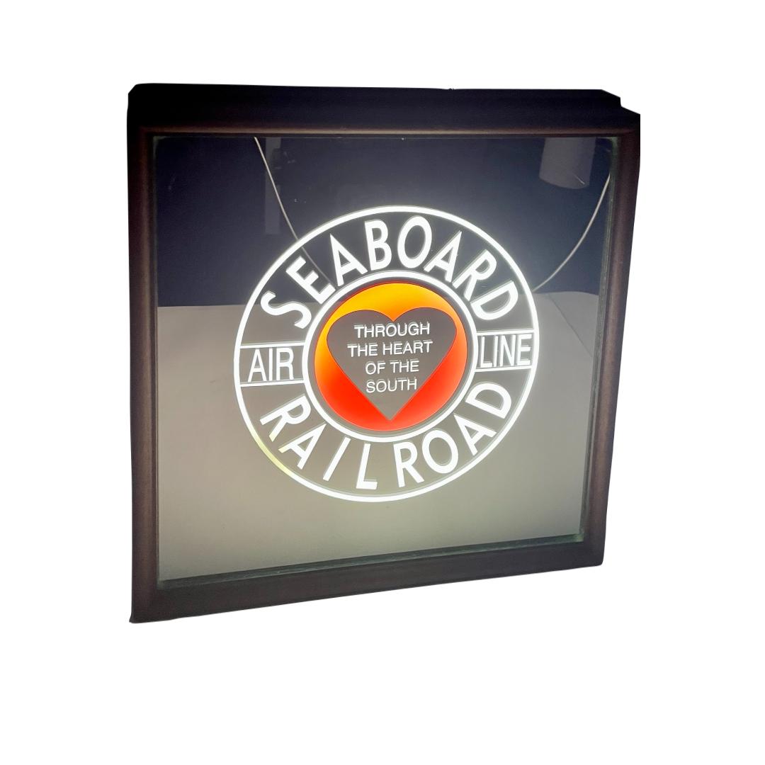 SEABOARD RAILROAD LIGHTED MIRROR: SEABOARD RAILROAD LIGHTED MIRROR MEASURES APPROX 12.5 X 12.5 X 3 TAG ON BACK READS BLASTED MIRROR SEABOARD AIR LINEMADE FOR GREAT SMOKEY MOUNTAIN RAILWAY