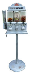 CHALLENGER NUT VENDING MACHINE: CHALLENGER NUT VENDING MACHINE WITH TRIPLE VENOR, PLUG IN FOR WARMING, AND CUPS DIMENSIONS 51.5 H X 16.5 W X 14 DEPTH , MACHINE IS IN GOOD CONDITION