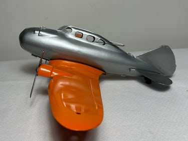 ORANGE AND SILVER METAL AIRPLANE