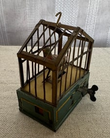 ANTIIQUE GERMAN SONGBIRD IN CAGE WIND UP TOY