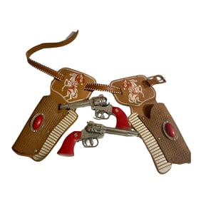 VINTAGE TOY GUNS AND HOLSTER RED AND TAN HOLSTER