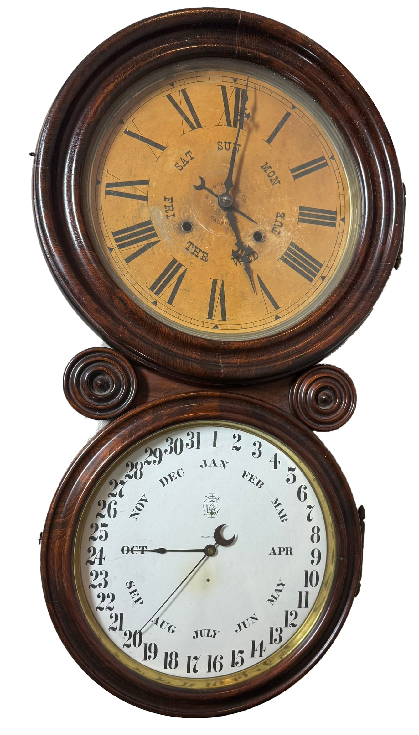 ENGRAM & CO FIGURE 8 CALENDAR WALL CLOCK: ENGRAM & CO FIGURE 8 CALENDAR WALL CLOCK. NICE COSMETIC CONDITION SEE PHOTOS FOR INTERIOR/ AS FOUND HAVE NOT TESTED. Measures 29" H X 14"W X 4 1/2"D