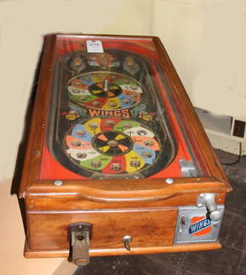 Pinball - Play Box: Table top pinball - Wings - Wooden cabinet Nice playing field, only minimal wear. Works on penny. Mech needs lubrication. 32 x 16.5 w x 9 in at highest.