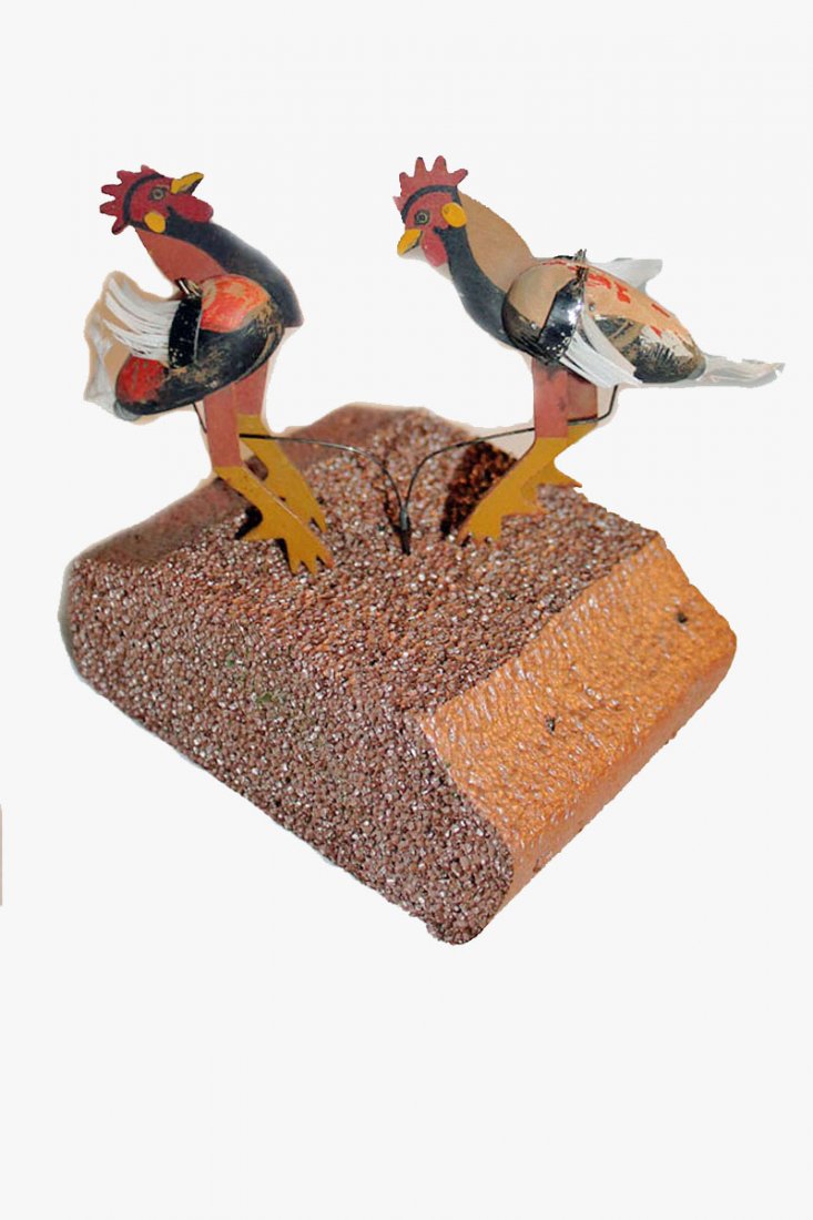 Phonograph Dancers - Game Cocks: Game Cocks constructed of light wood with feathers. Cocks are attached to thin wire yoke. Colors are good. Some bending of feathers. Cocks are approximately 3" H.