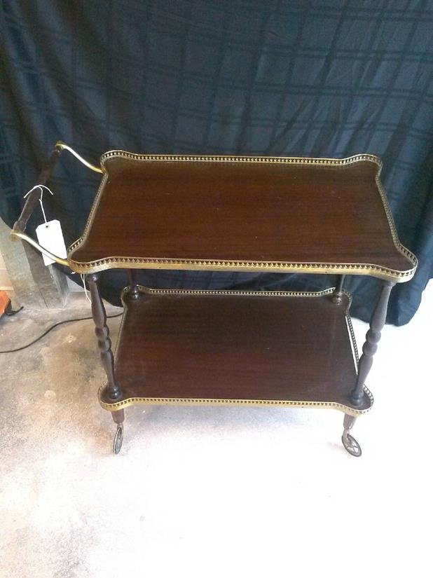 Vintage Bar Cart: Authentic vintage bar cart. This thing just oozes Madmen. Add an ice bucket, some booze, and a martini shaker and you are set.