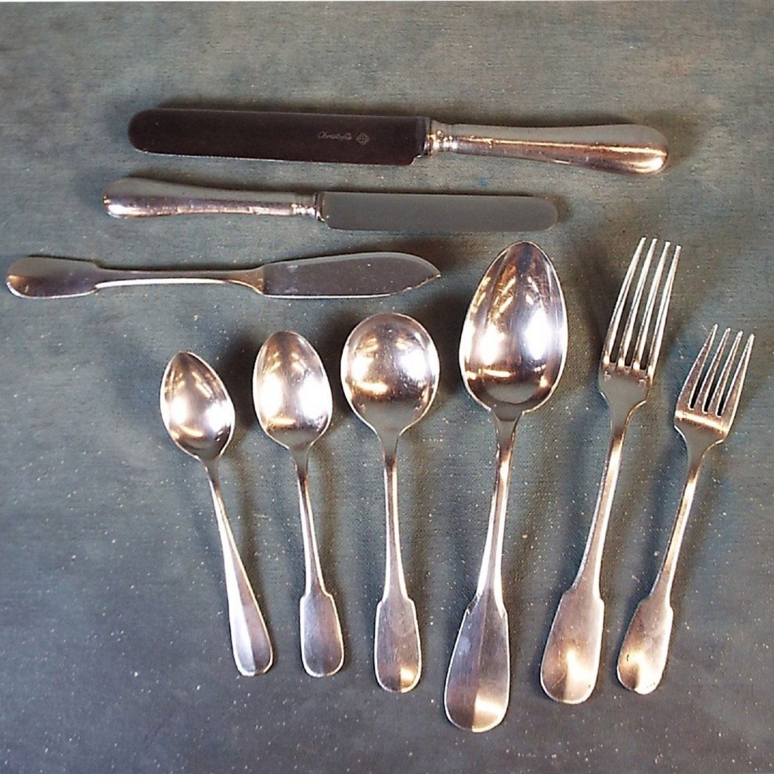 37pcs Christolfe & Art Krupp Berndorf Flatware: Misc. 29pcs Christolfe & 8pcs. of Art Krupp Berndorf Flatware:Berndorf: 4 Forks, 4 Spoon. Christolfe: 10 Case Knives: 5 @ 8.5", 5 @ 10", 2 Butter Knives, 3 Serving Spoons, 6 Continental-size Dinner Fo