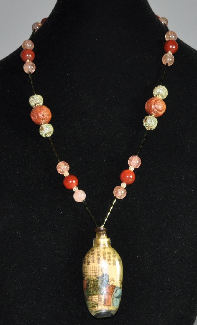 A rare Qing Dynasty necklace and snuff  bottle (1 of 7)