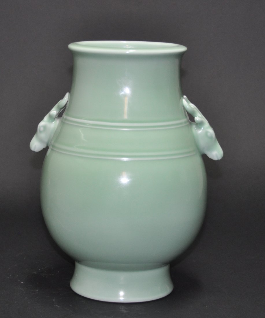 A Qing Qianlong pale green -ground hu vase (1 of 5)