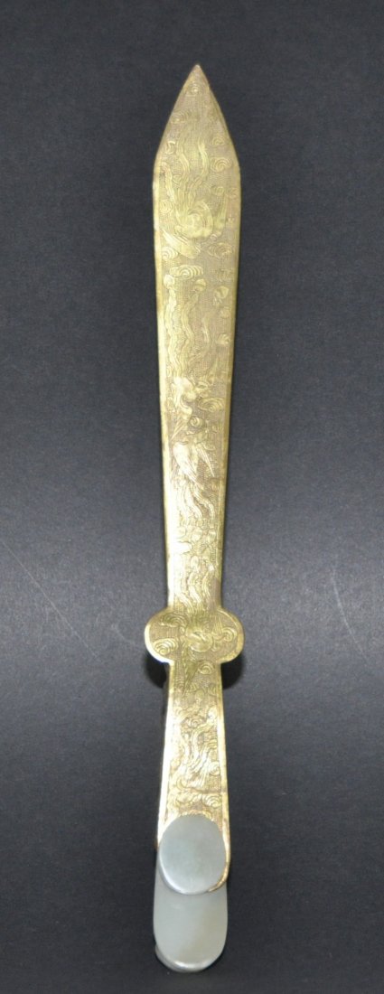 A Qing Dynasty jade and gilt- bronze Open letter knifer: A Qing Dynasty jade and gilt -bronze Open letter knifer. Length 23.5 cm.