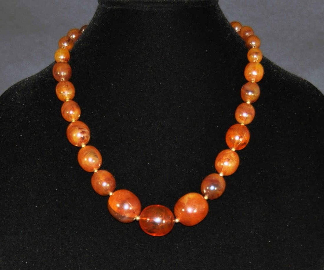 An amber beaded necklace (1 of 4)