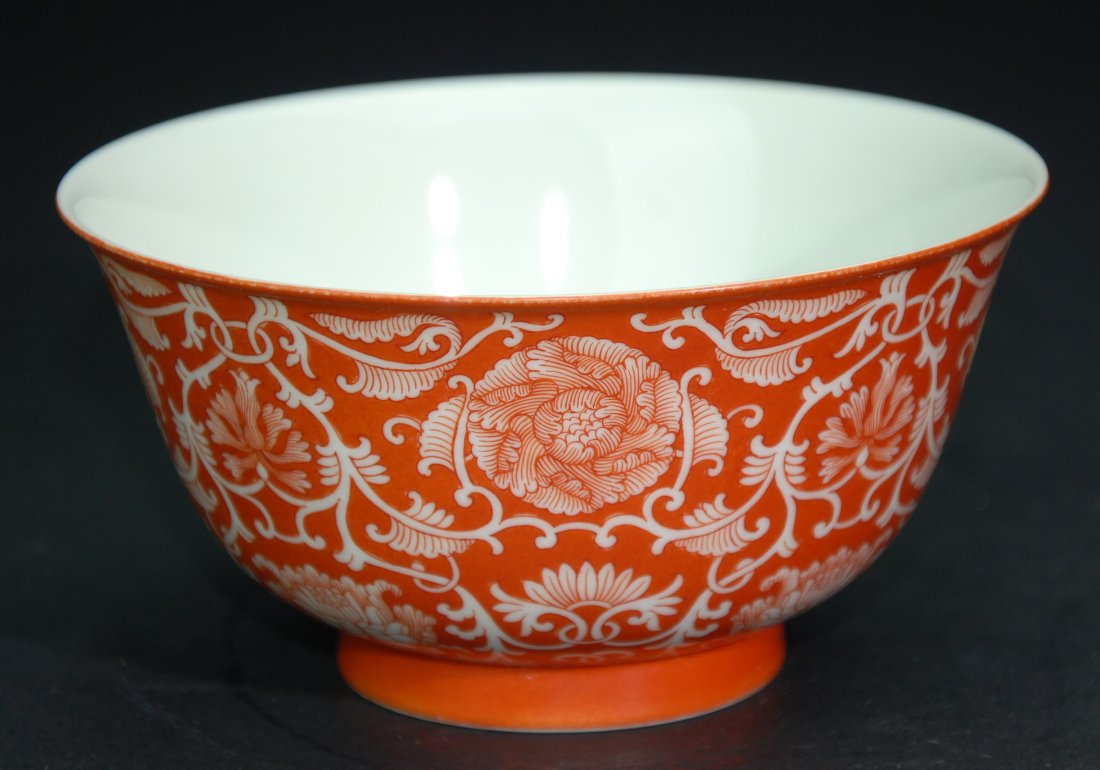 A rare Qing Dynasty QianLong coral-ground bowl (1 of 9)