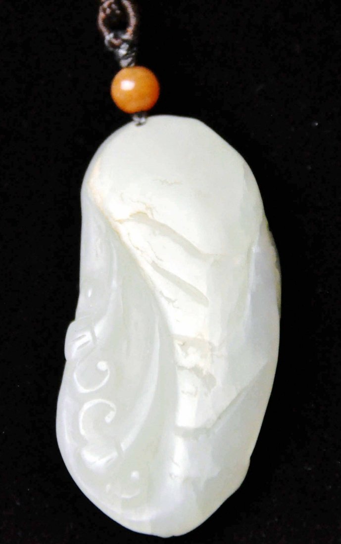 A Qing Dynasty white jade carving (1 of 4)