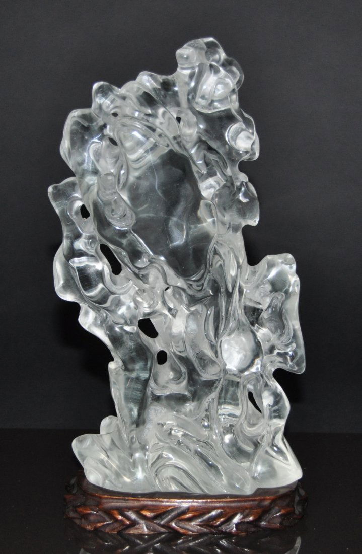 A Qing Dynasty transparent carved rock-crystal (1 of 8)