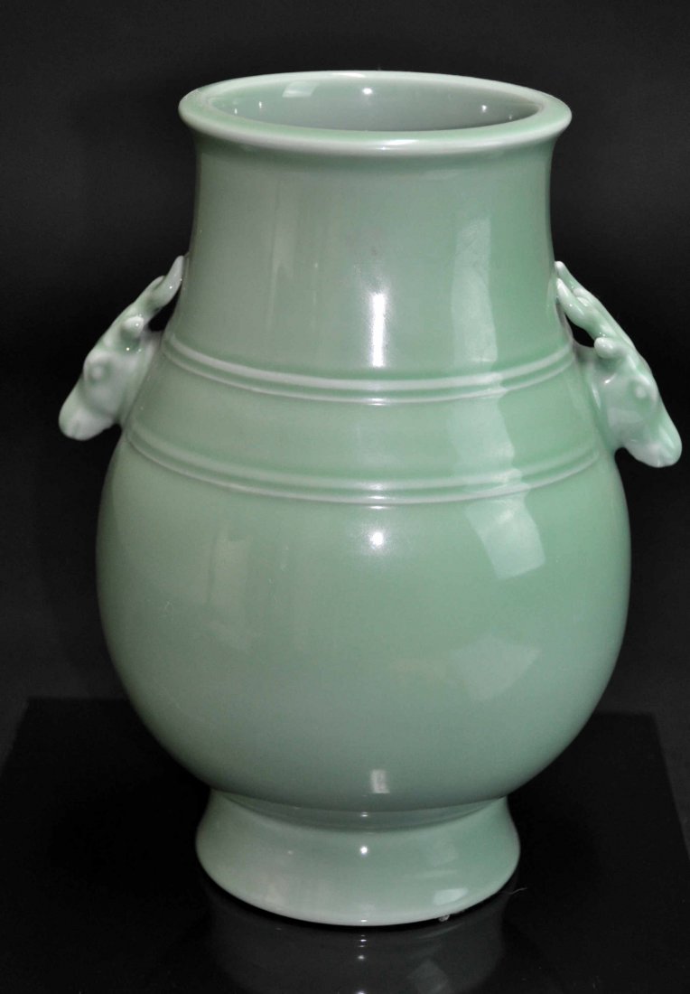 A Qing Qianlong pale green -ground hu vase (1 of 6)