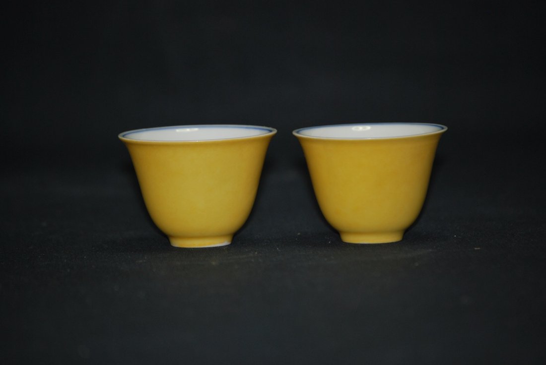 A pair of yellow cups: This cup is very thin, there has a Longevity word with green pattern, the bottom has a three words mark. Height 6.2cm