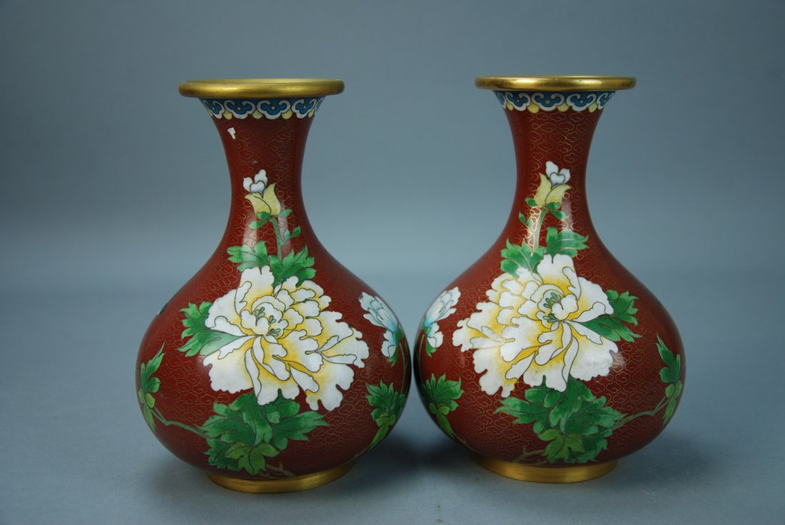 A pair of 19th century enamel floral vases: This piece is very beautiful, the red background highlights the chrysanthemum flowers. The contrast of colors help add to this beauty. Height 7.2 in