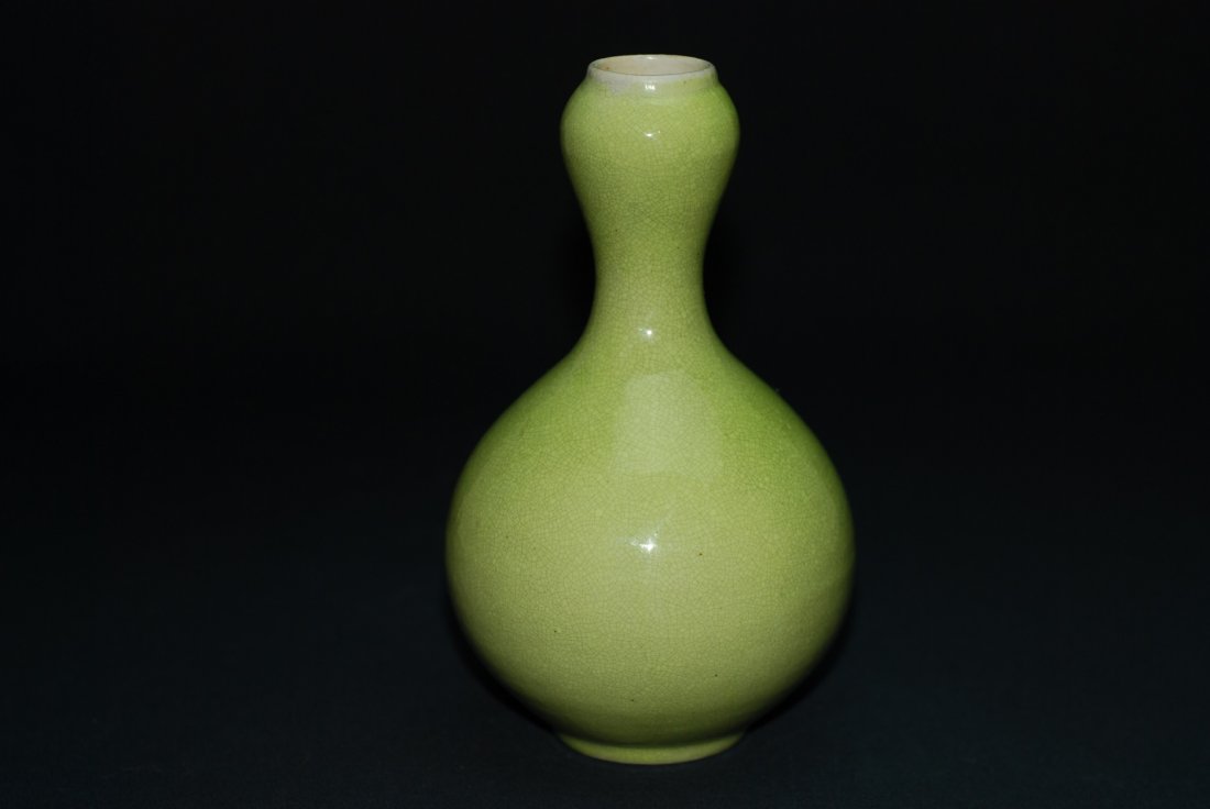 A Qing Dynasty lemon-yellow glaze vase: This piece was created with much patience, the glaze is very well done. This color of lemon-like color is very beautiful. Height 7.2 in, Diameter of base 2 in