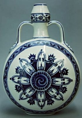 A Ming period Xuande blue and white porcelain vase: This piece is very beautiful and peculiar. This vase is decorated with many beautiful designs and patterns. Provenance: A British private collection. Height 11 in