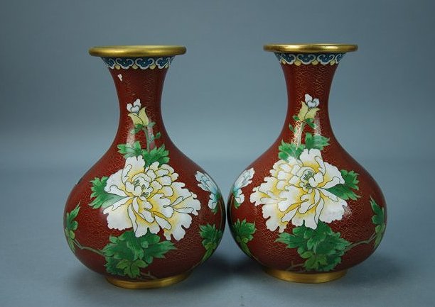 A pair of 19th century enamel floral vases: This piece is very beautiful, the red background highlights the chrysanthemum flowers. The contrast of colors help add to this beauty. Height 7.2 in