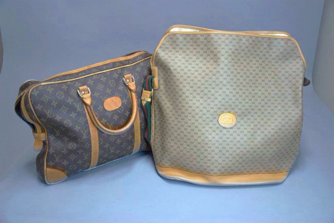 A Louis Vuitton suitcase travel bag and Gucci bag (1 of 10)