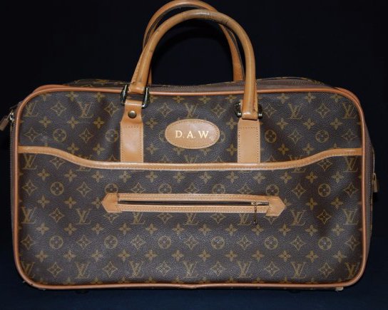 A Louis Vuitton Monogram suitcase travel bag (1 of 8)