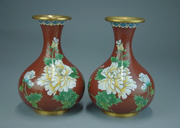 A pair of 19th century enamel floral vases: This piece is very beautiful, the red background highlights the chrysanthemum flowers. The contrast of colors help add to this beauty. Height 7.2 in