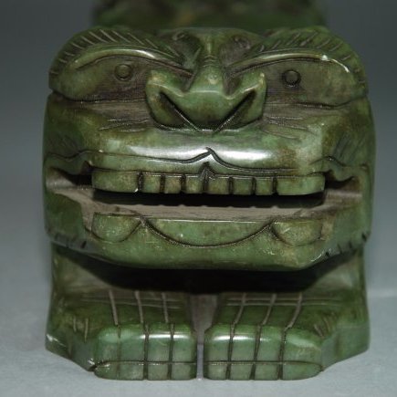 An Antique Yu Hu container: This box is a ferocious tiger lying. On top of the head is also inscribed "King" character, the back also inscribed "shou" character, the box can be opened. Length 10 in, Height 3.5 in.