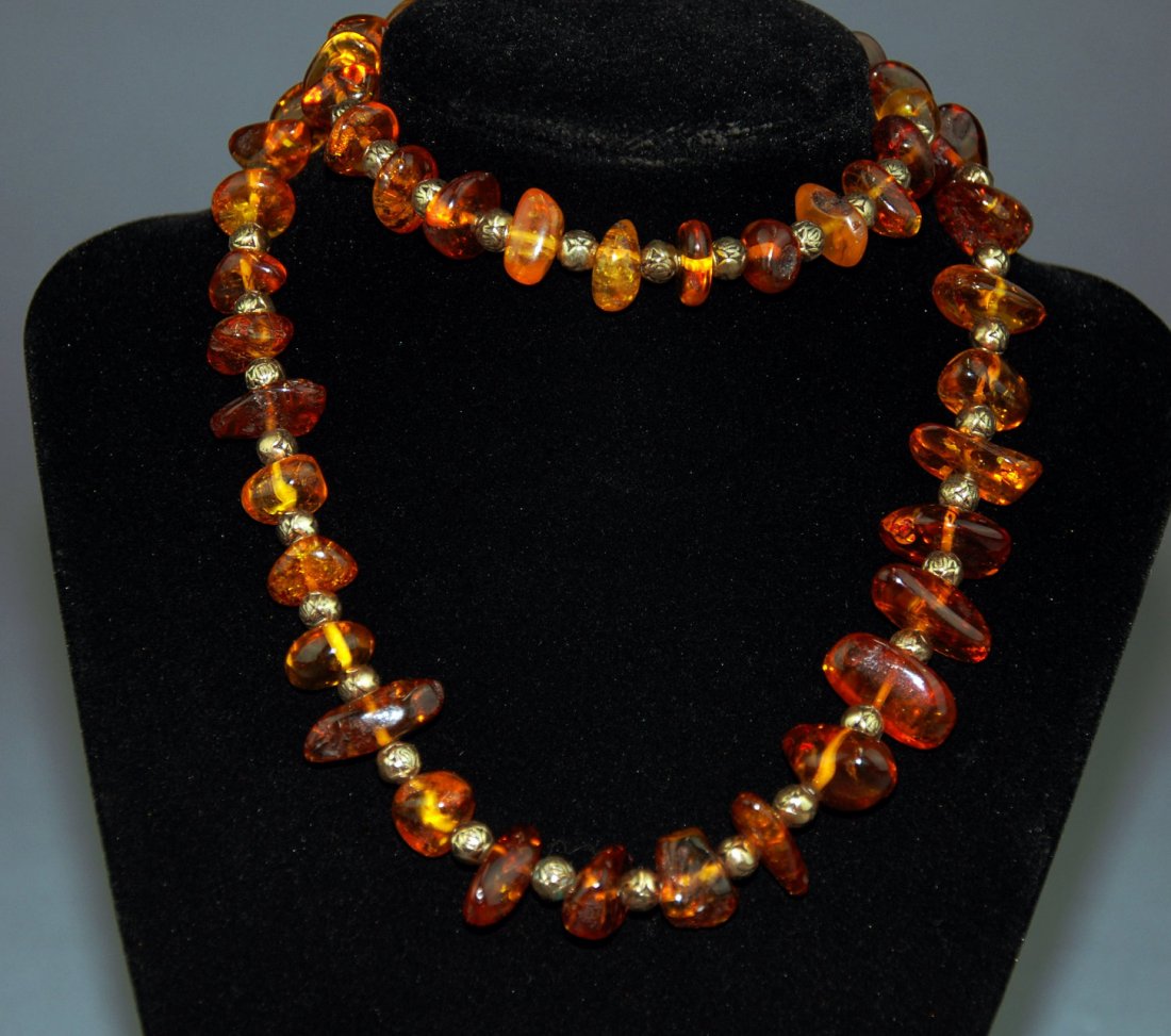 An antique natural amber beaded necklace (1 of 4)