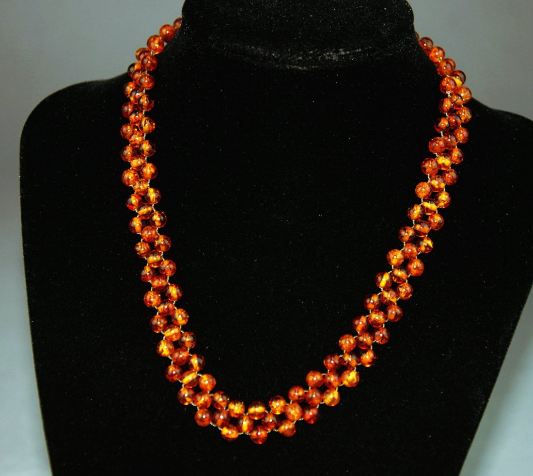An antique natural amber beaded necklace (1 of 5)
