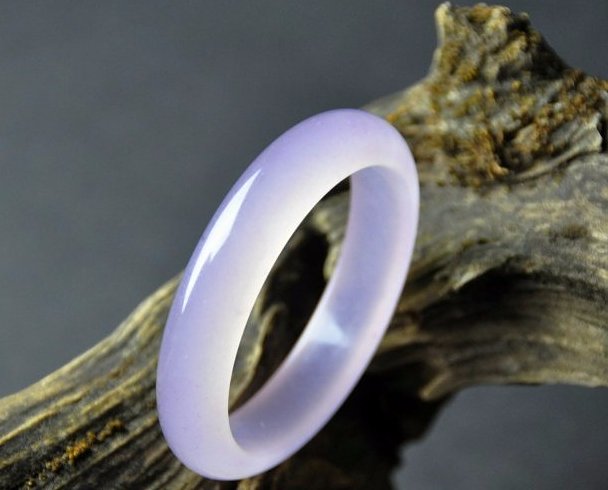 A translucent  purple jadeite bangle (1 of 6)