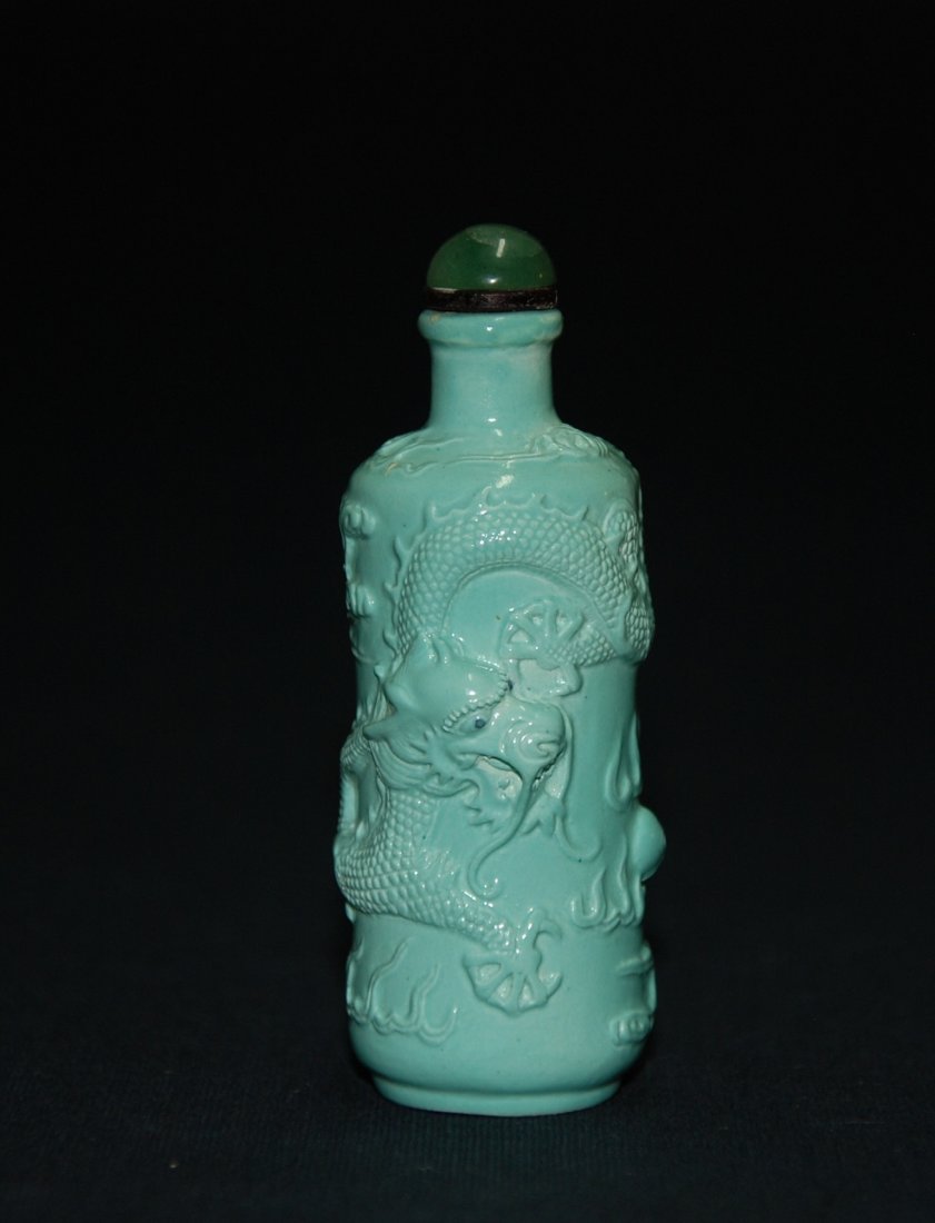 A 18th century carved turquoise glaze snuff bottle (1 of 9)