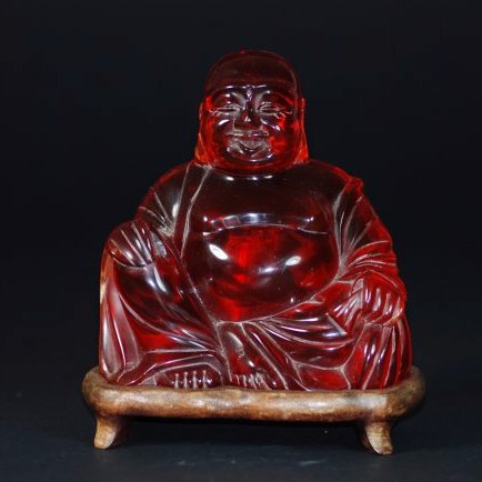 A Large  amber carving budhai (1 of 4)