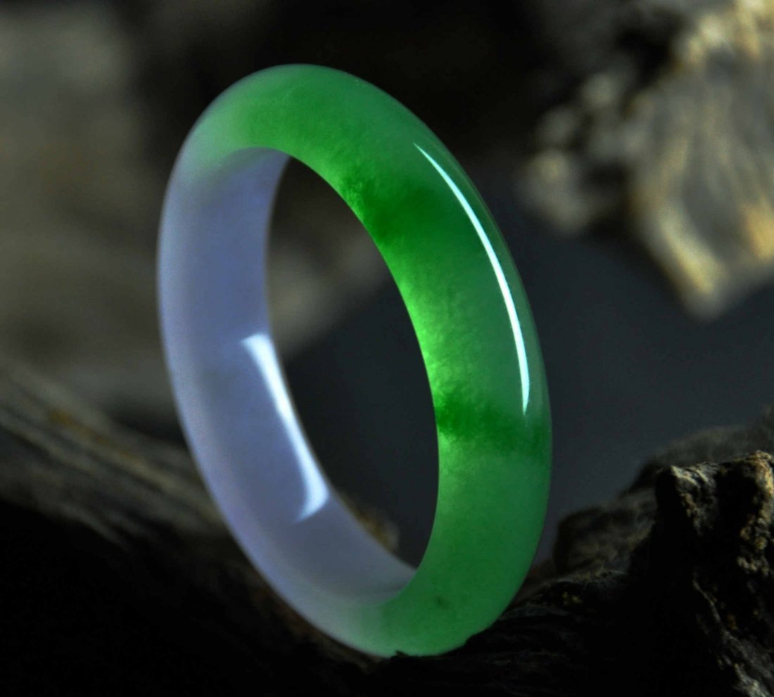 A translucent purple and green jadeite bangle (1 of 5)