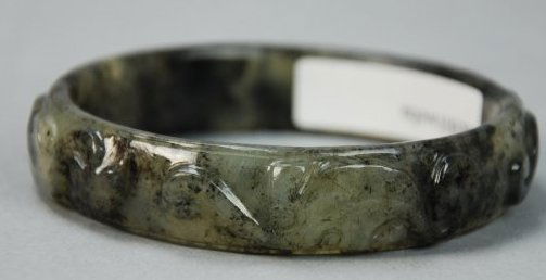 A Han Dynasty carved jade bangle (1 of 3)