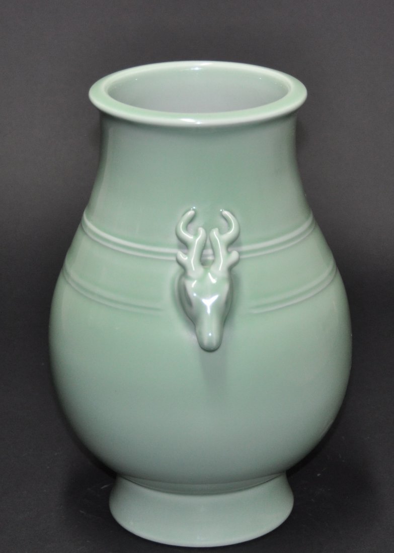 A Qing Qianlong pale green -ground hu vase (1 of 6)