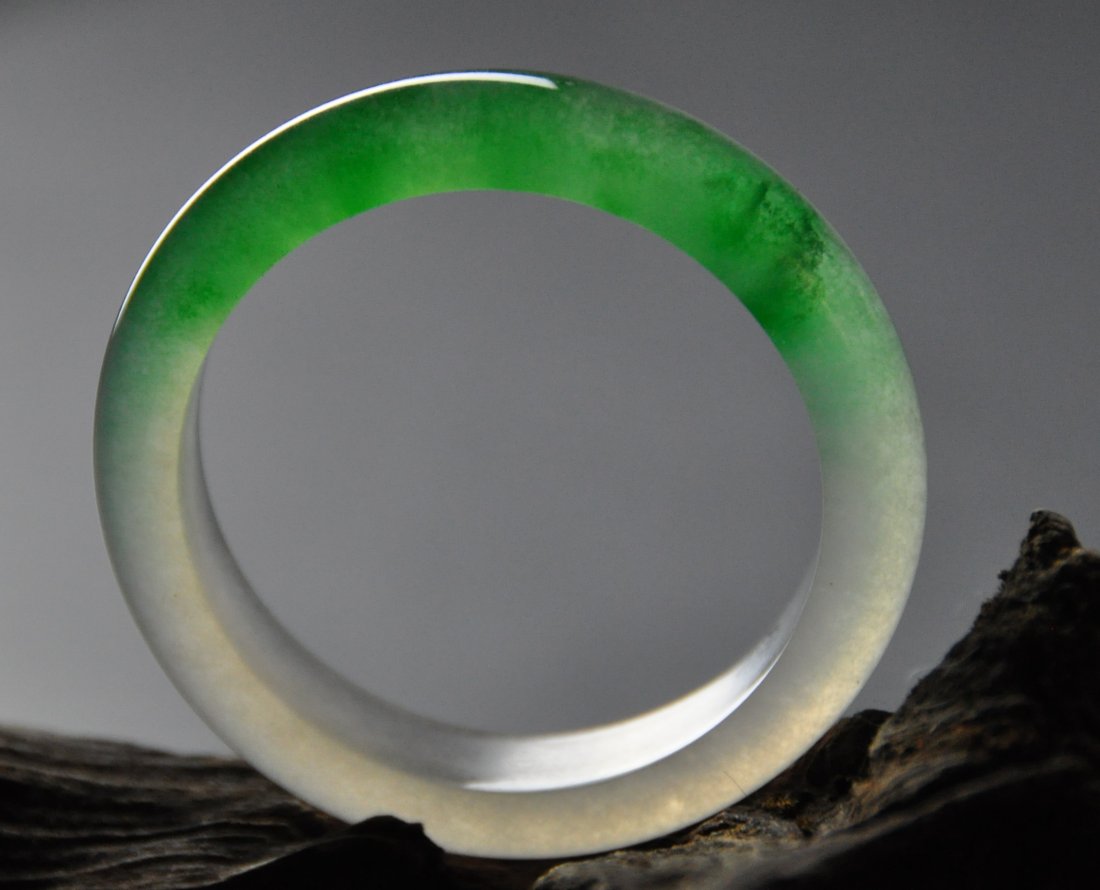 A translucent green and white jadeite bangle (1 of 7)