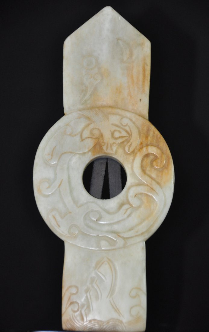 A Zhou Dynasty white/brown jade tablet (1 of 9)