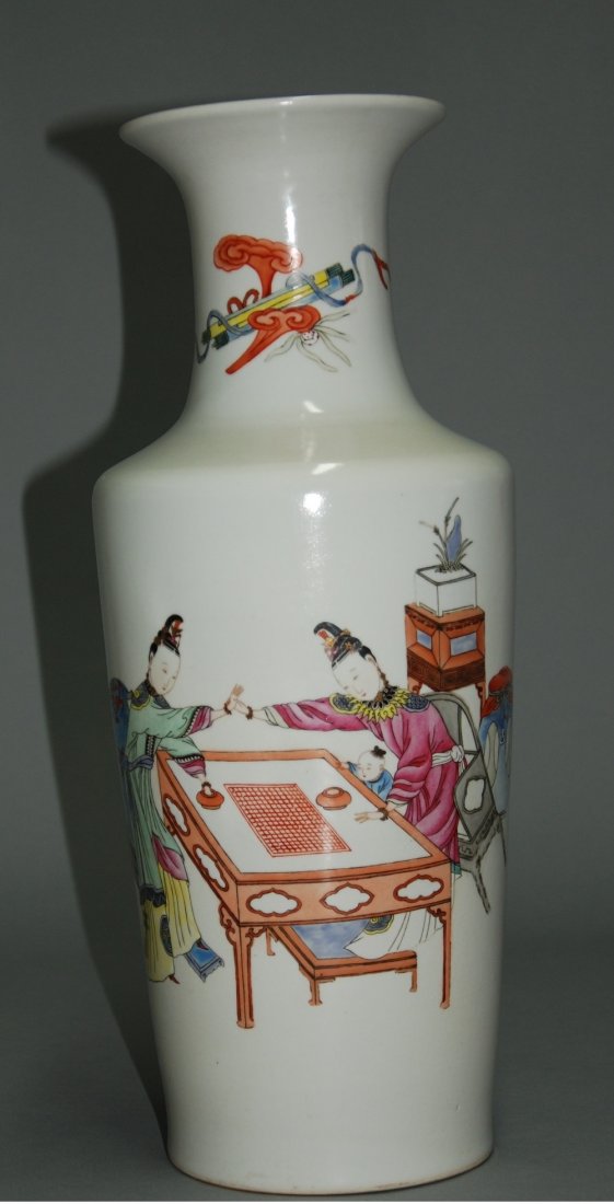 A Qing Dynasty YongZheng famille rose enameled vase: Yongzheng of the Qing Dynasty vase depicts two ladies maid beside playing chess with children. The bottle neck depicts painted lines and the Ganoderma Bogut workmanship is very fine.Yongzheng of the p